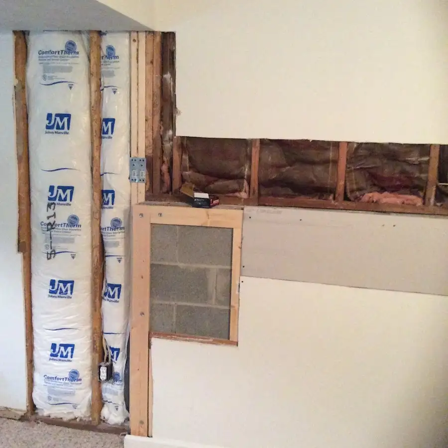 Wall insulation replacement during Basement Flood Cleanup in Swansea